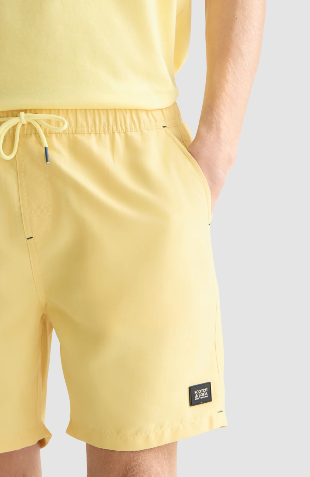Solid midlength swim shorts