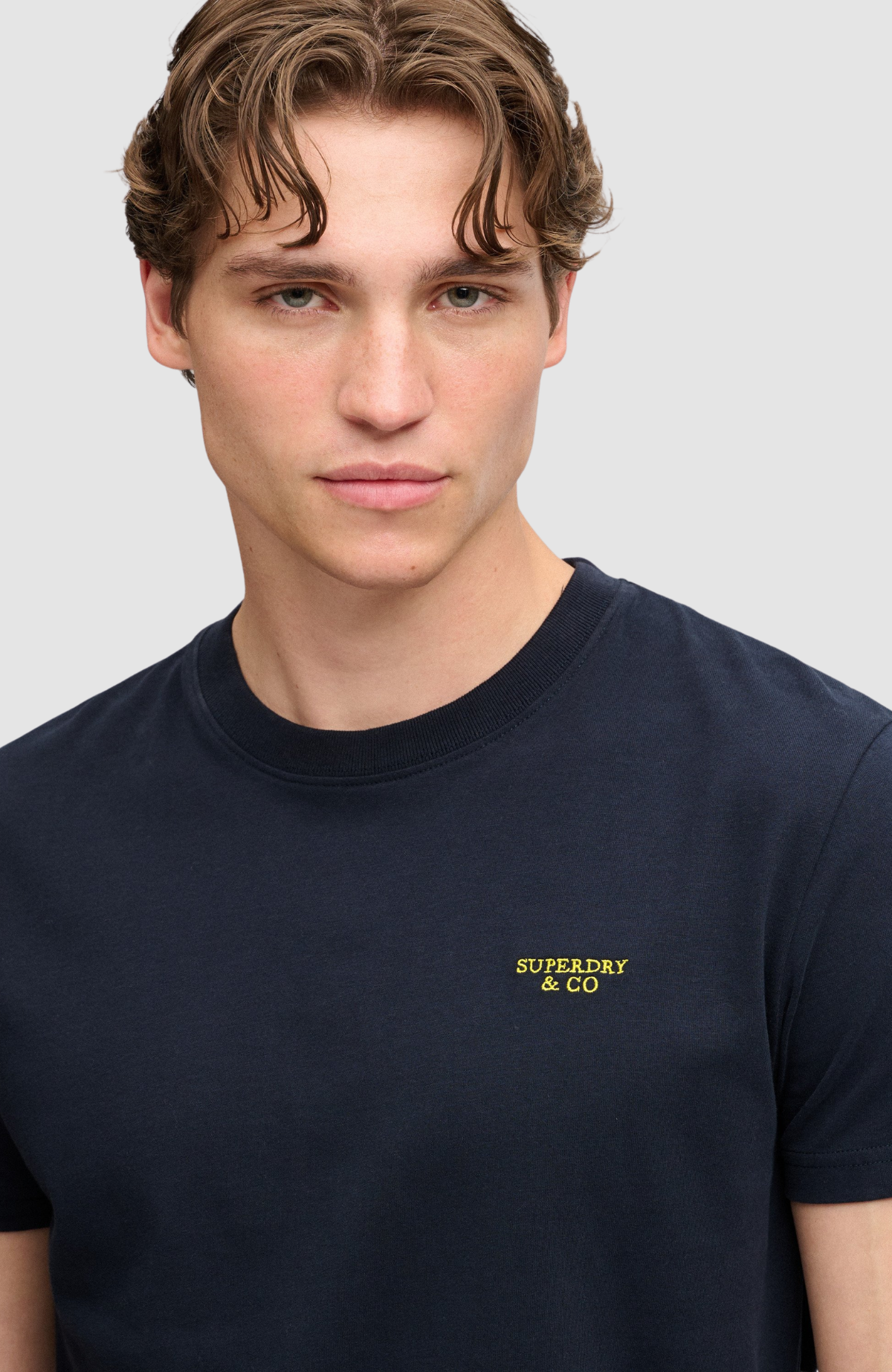 Essential Stacked Logo Emb Tee