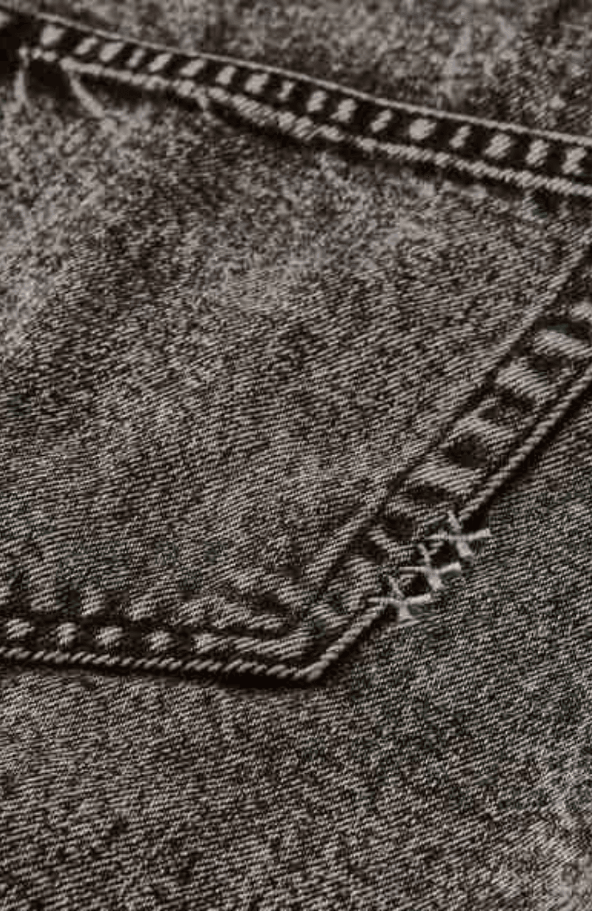 Seasonal fold over black denim skirt with wash effects