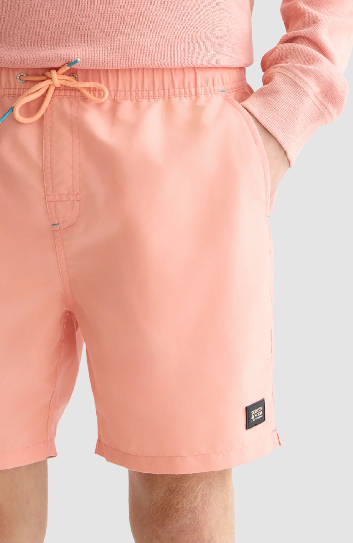 Solid midlength swim shorts