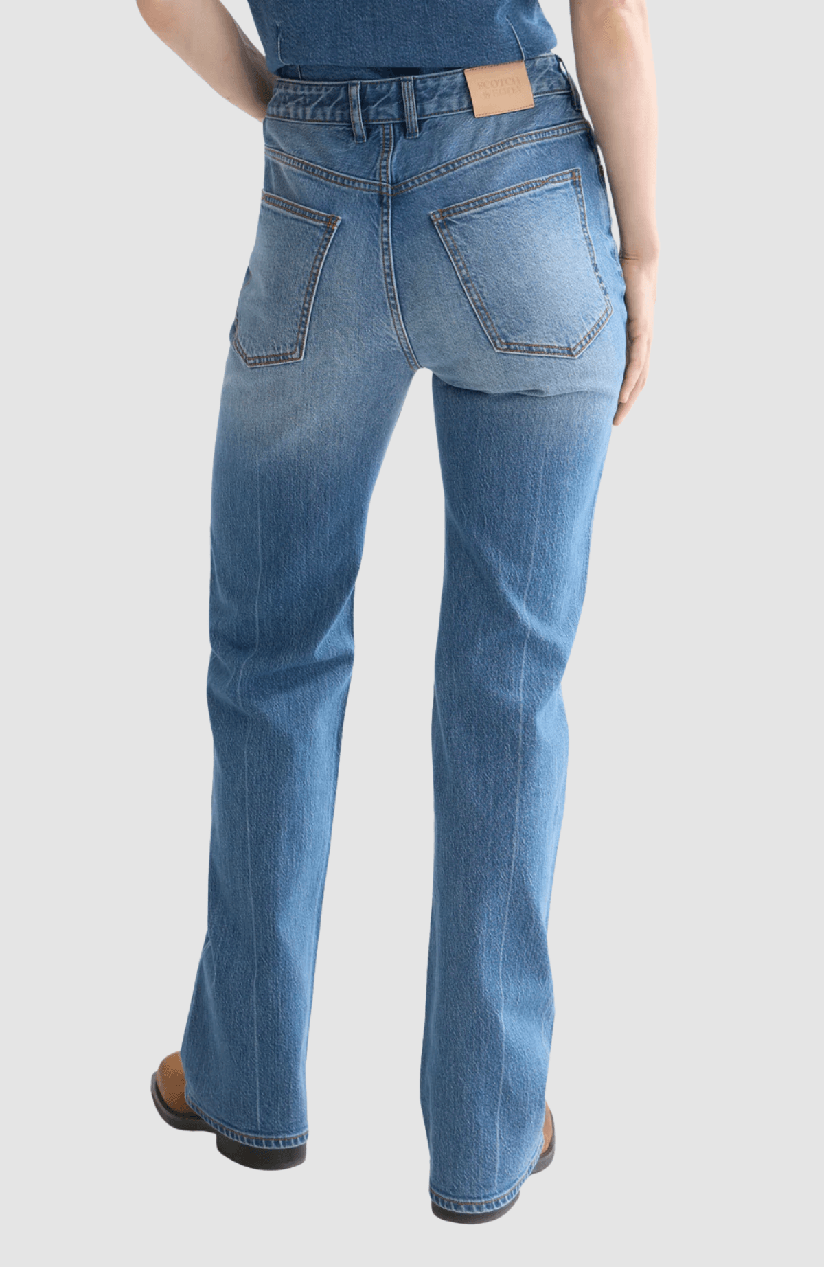 The Glow bootcut jeans — Texas Sun