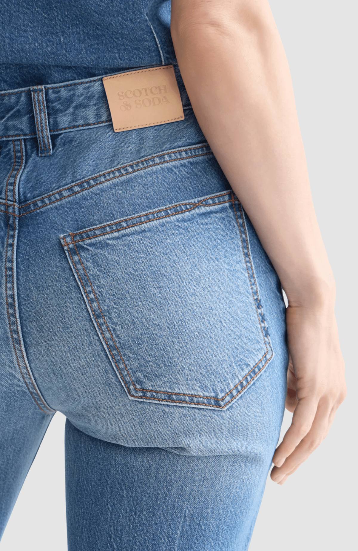 The Glow bootcut jeans — Texas Sun