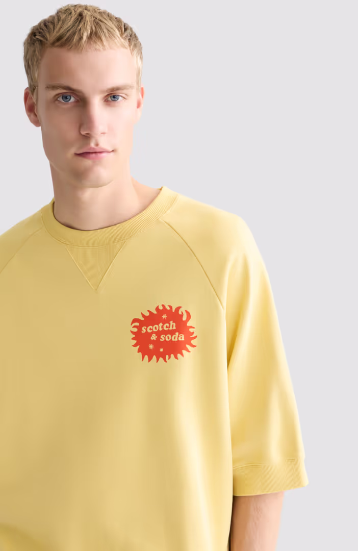 Front and back artwork loosefit shortsleeve sweatshirt