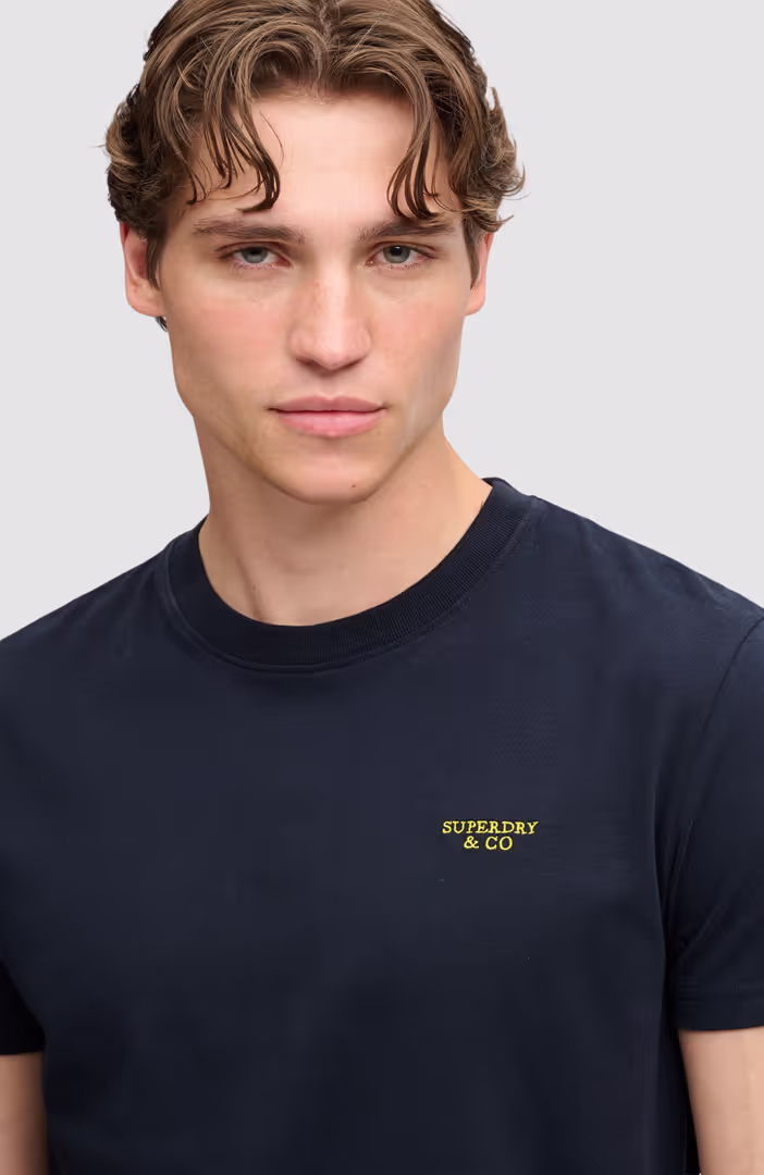 Essential Stacked Logo Emb Tee