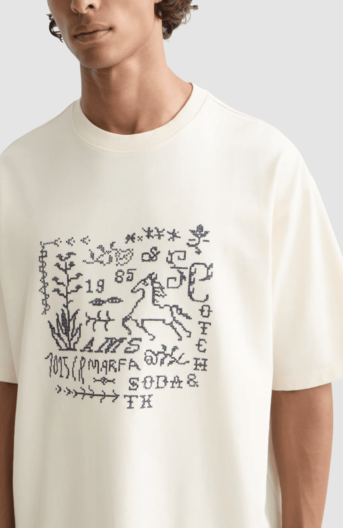 Cross-stitched front artwork loose-fit T-shirt